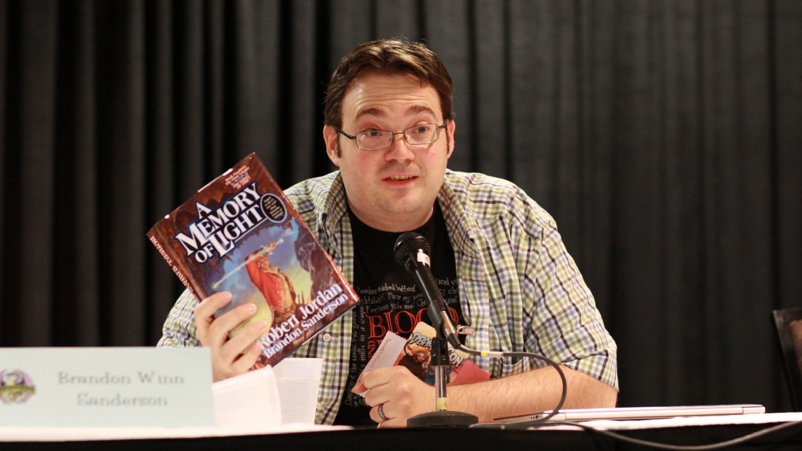 Brandon Sanderson's work is never labelled as romantasy, despite several elements